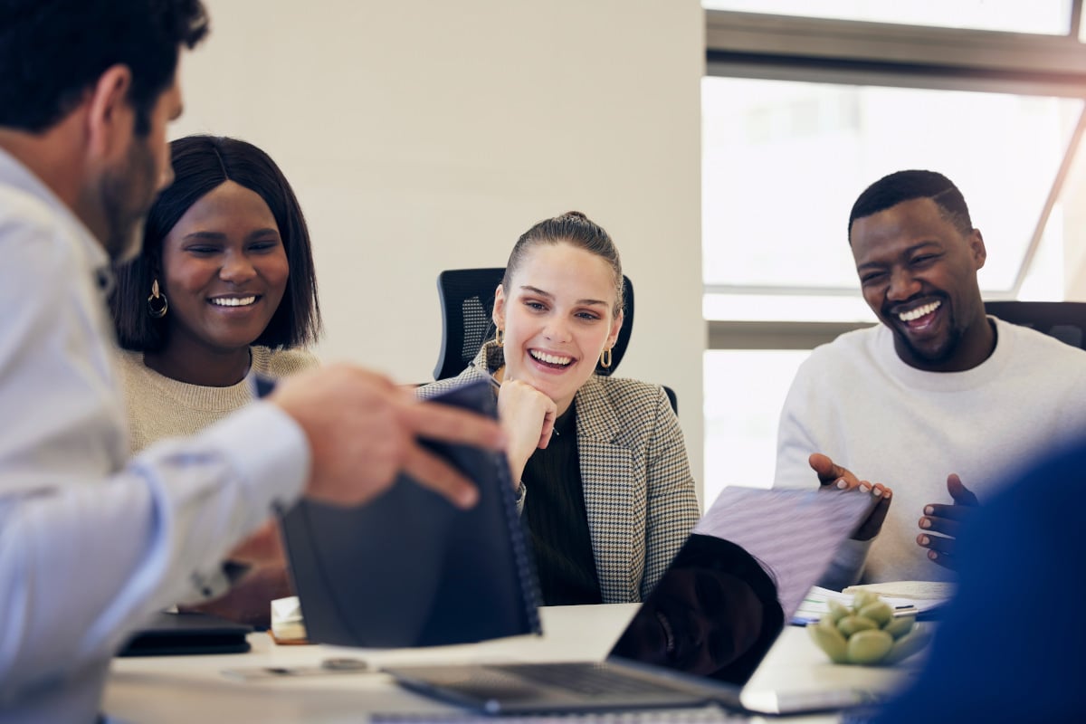 happy business people at meeting